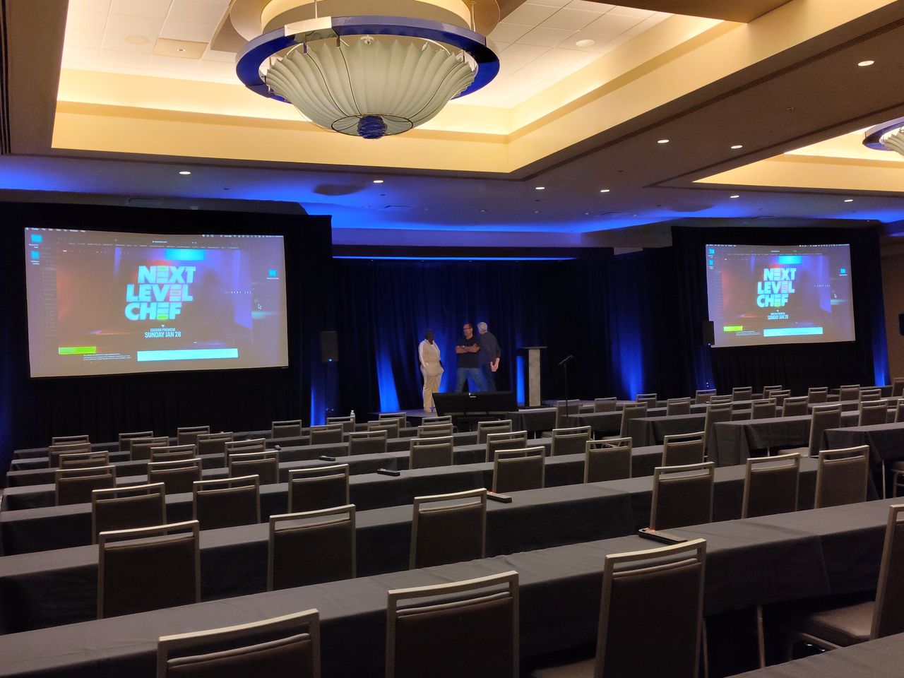 Corporate general session with projection screens